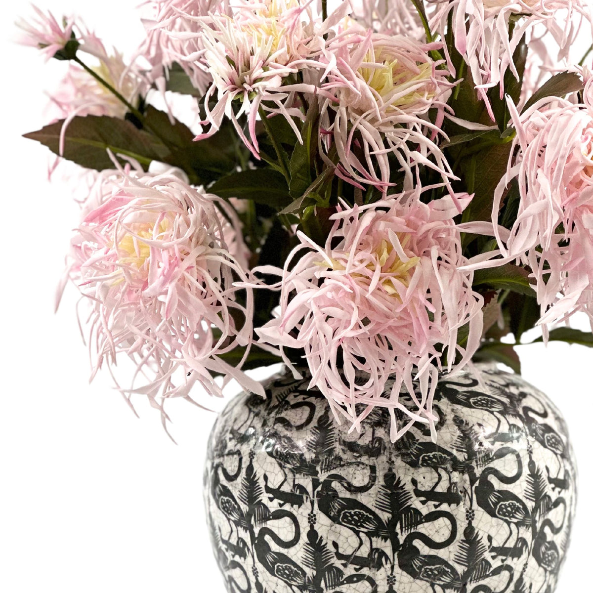 Spider Chrysanthemum Lilac Arrangement in Crane Ceramic Vase. Close up view. Plant Couture.