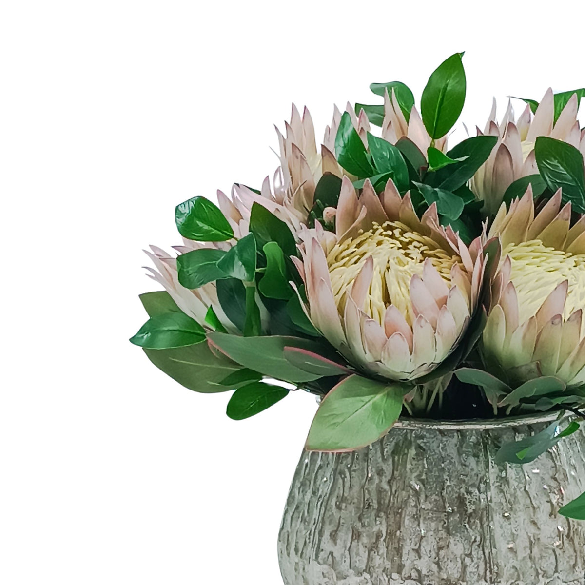 Protea Arrangement in Aged Silver Tin. Silk flower arrangement side view. Available from www.plantcouture.co.za