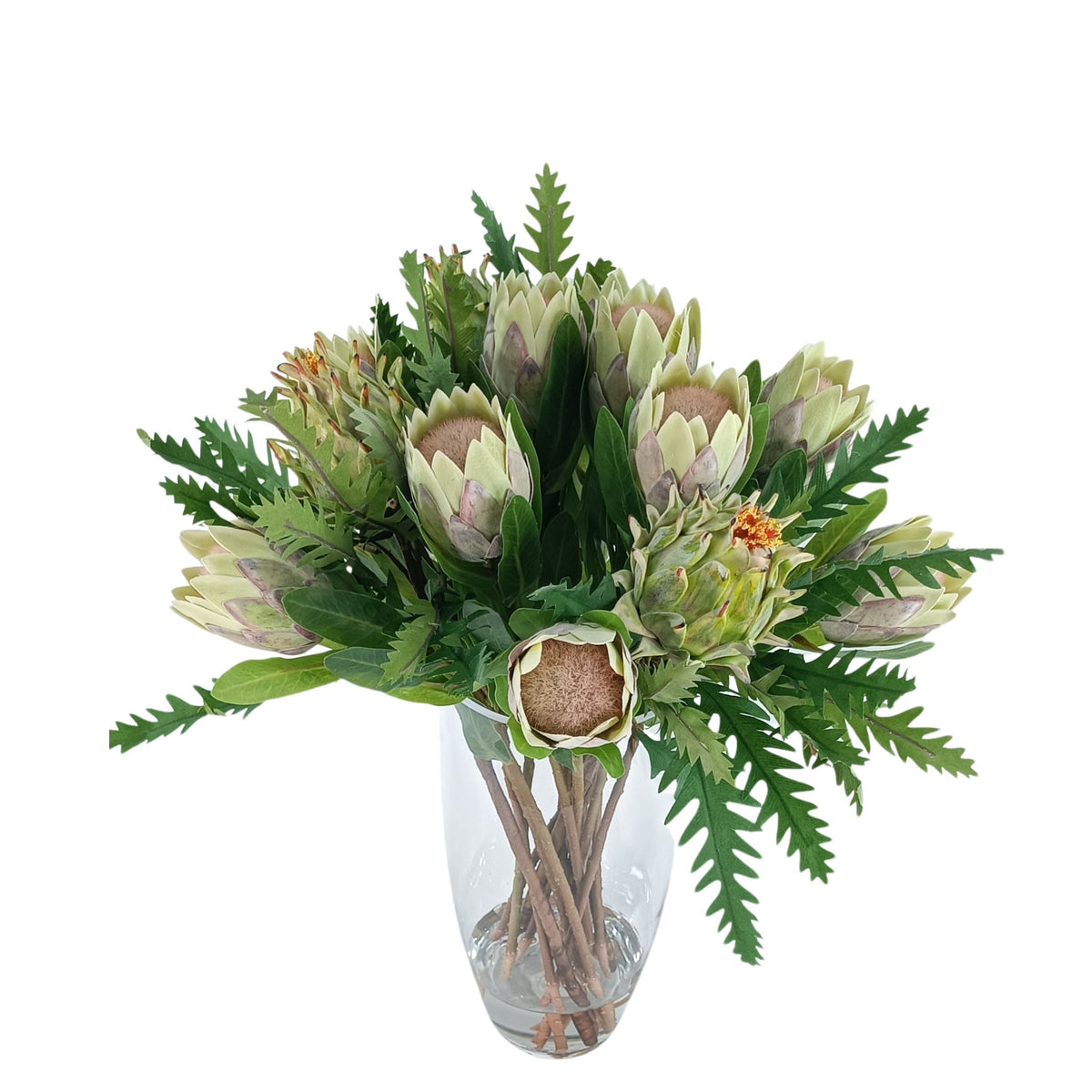Protea Artichoke Silk Flower Arrangement in Glass Bullet Vase. Top view of this arrangement available from www.plantcouture.co.za.