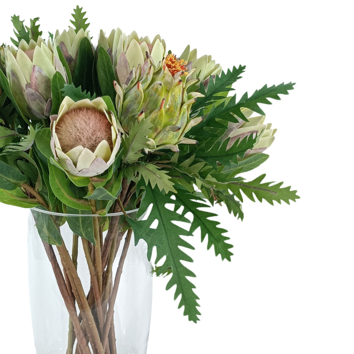 Protea Artichoke Silk Flower Arrangement in Glass Bullet Vase. Close up side view of this arrangement available from www.plantcouture.co.za.
