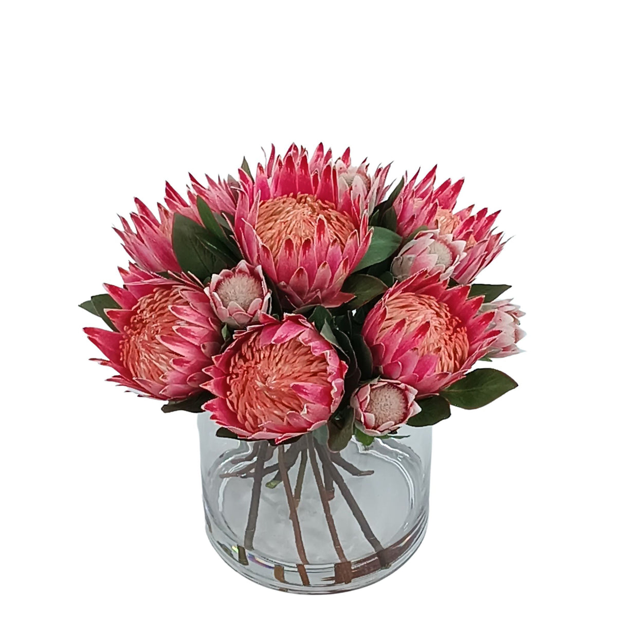Protea Mix Silk Flower Arrangement in Cylinder Glass Vase. Top view of arrangement available from www.plantcouture.co.za