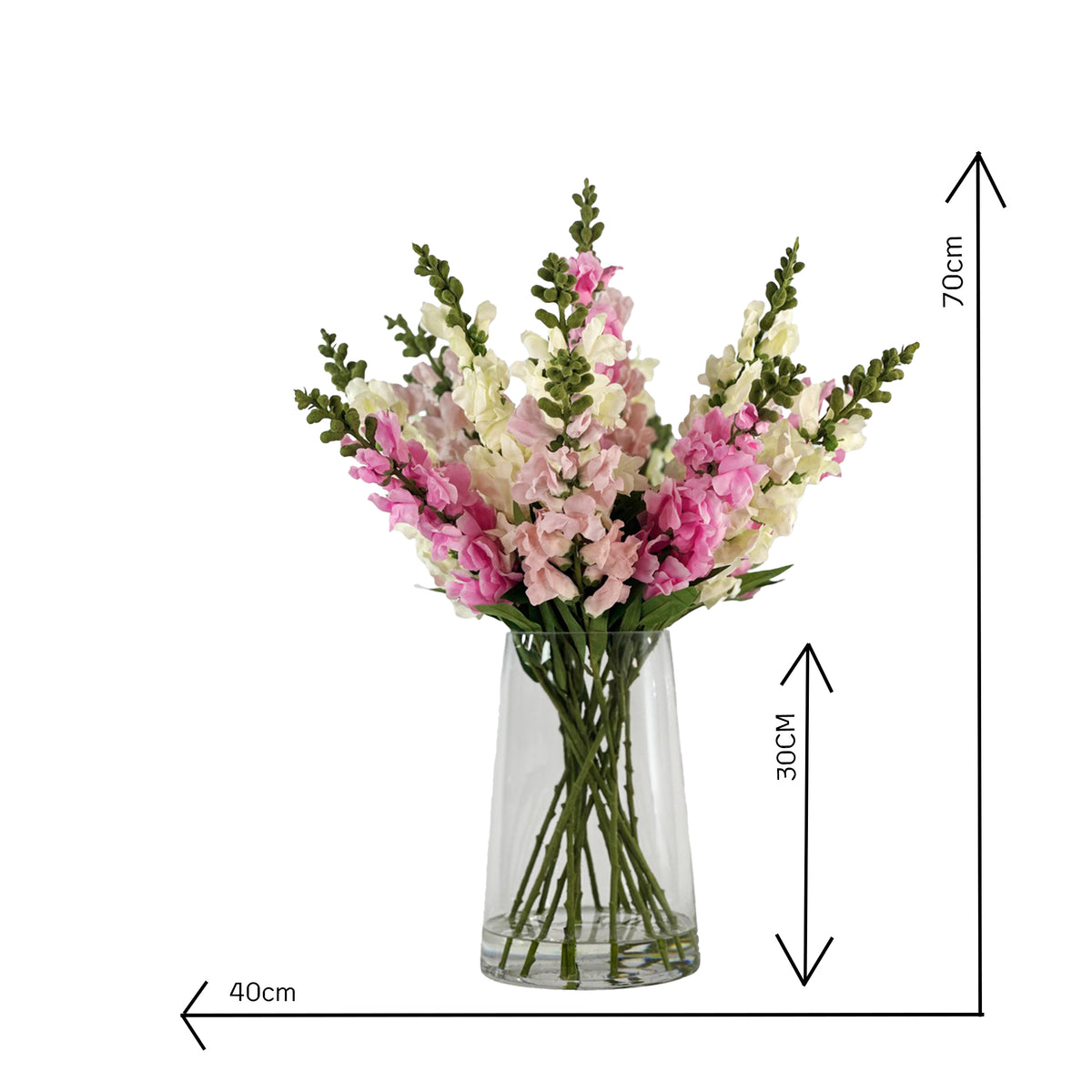 Bouquet of faux pink and white snapdragons in a clear glass vase with faux water on a white background with measurements