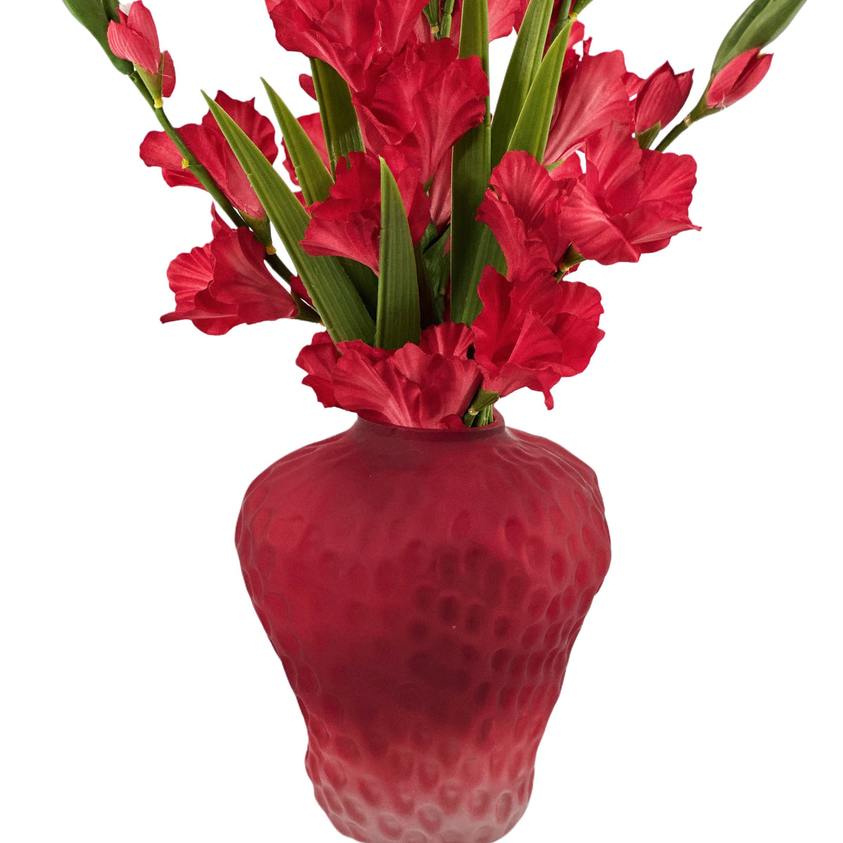 CLOSE UP OF ARTIFICIAL GLADIOLUS RED IN STRAWBERRY VASE 