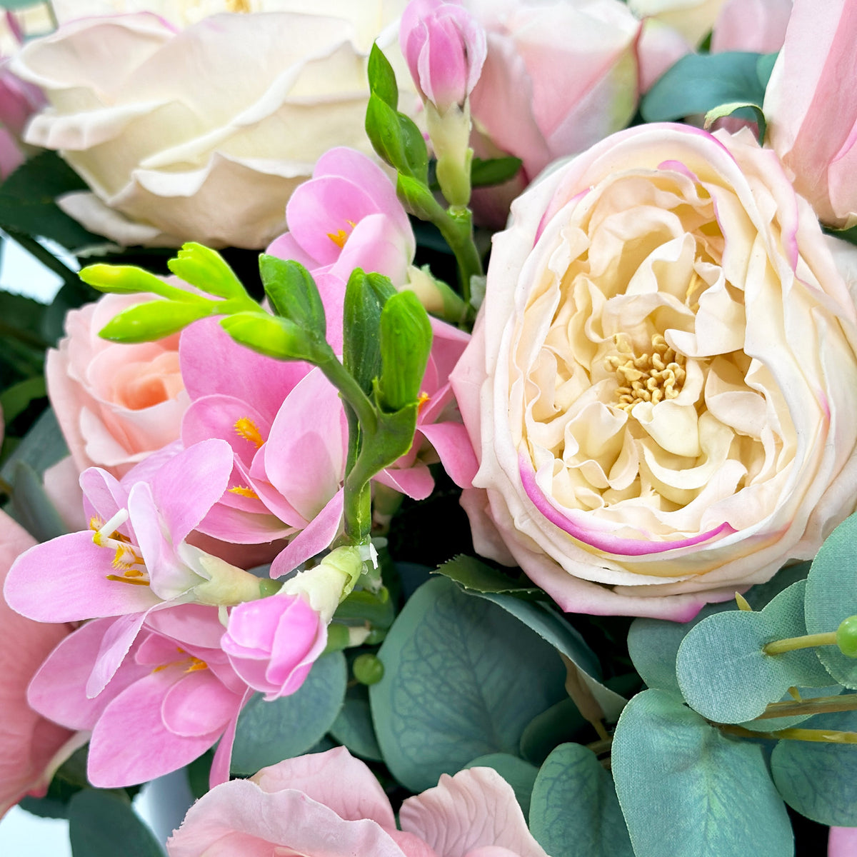 Mix Rose Arrangement In Tortoise Shell Vase