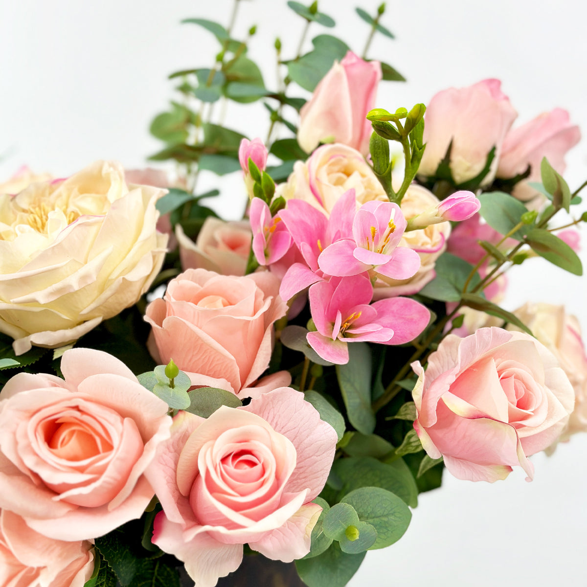 Mix Rose Arrangement In Tortoise Shell Vase
