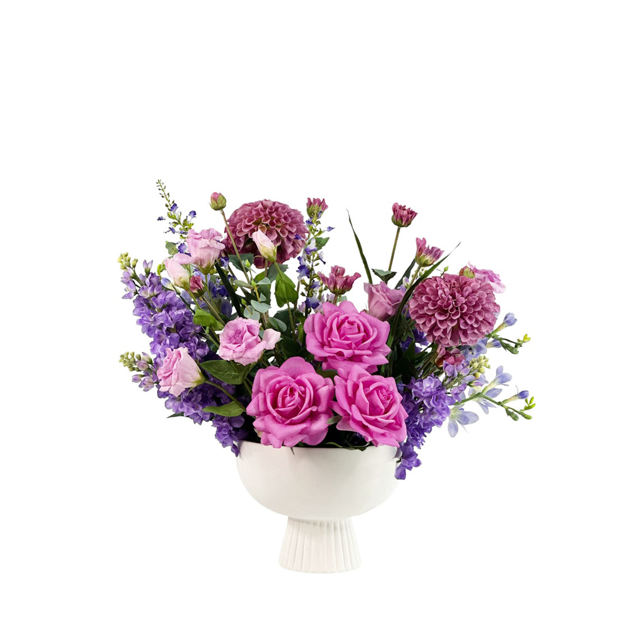 Bouquet of pink and purple flowers in a white vase on a white background