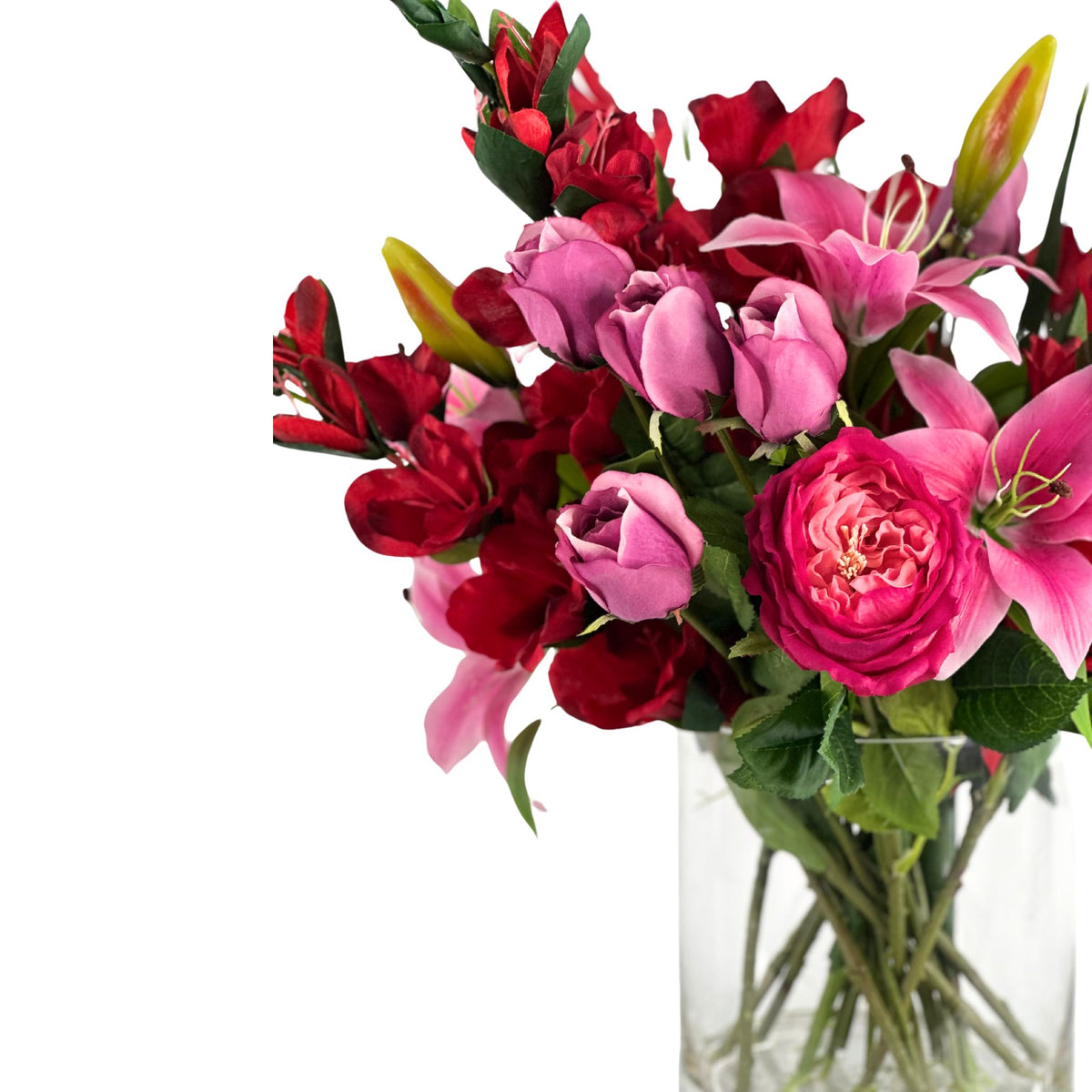 Mix Arrangement Lilly Gladiolus Roses in Glass Vase. Side close up view of the life like silk flower arrangement. Available from Plant Couture.