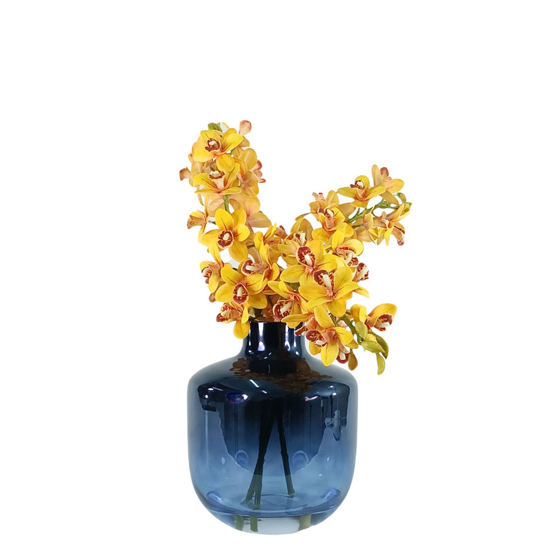 Cymbidium Orchid Yellow Arrangement in Blue Glass Vase. Full view of silk flowers. Available from www.plantcouture.co.za