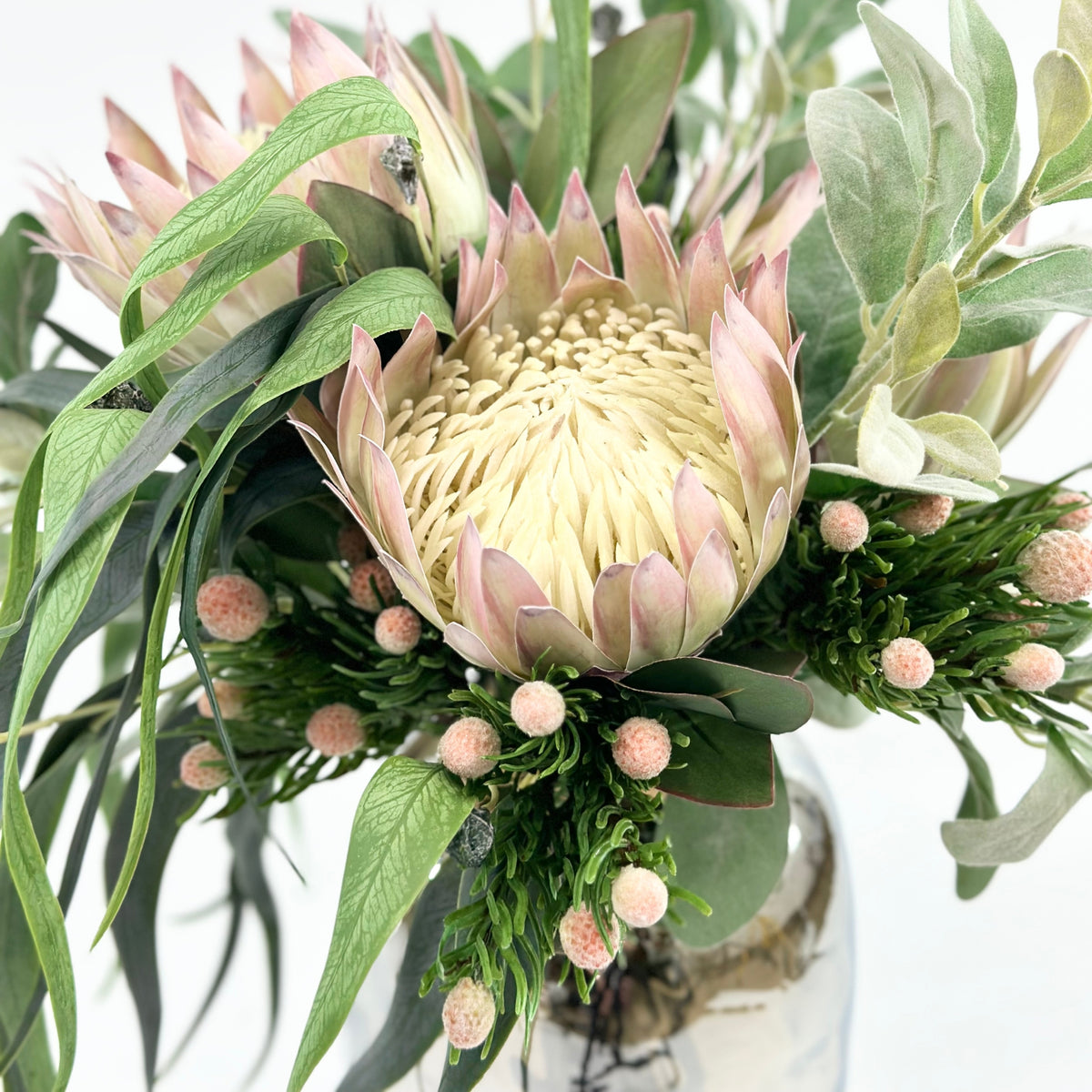 Proteas Eucalyptus Arrangement in Shiny Vase