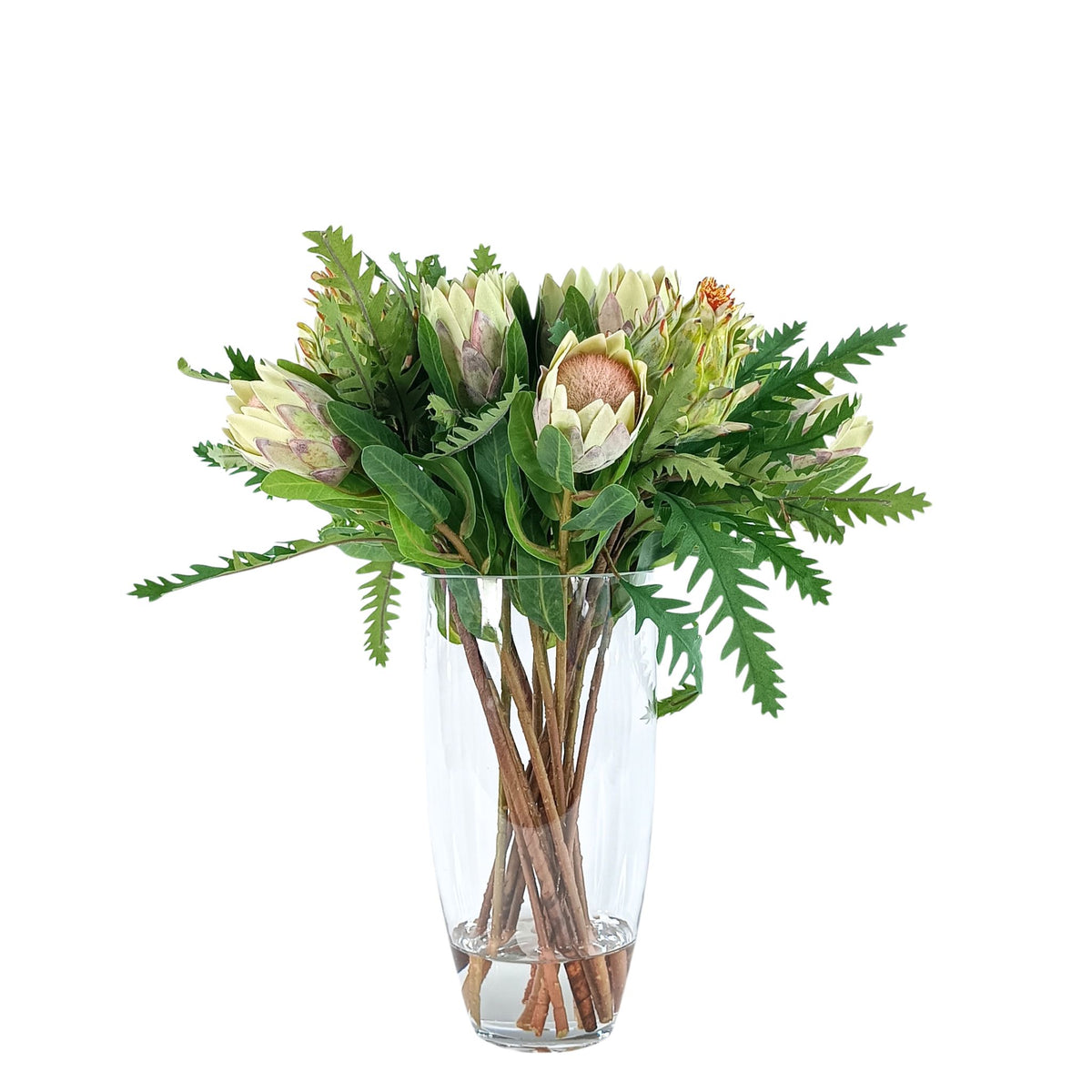 Protea Artichoke Silk Flower Arrangement in Glass Bullet Vase. Front view of this arrangement available from www.plantcouture.co.za.