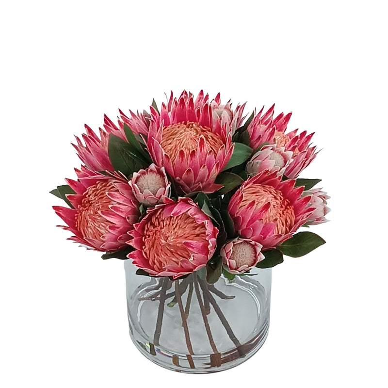 Protea Mix Silk Flower Arrangement in Cylinder Glass Vase. Top view of arrangement available from www.plantcouture.co.za
