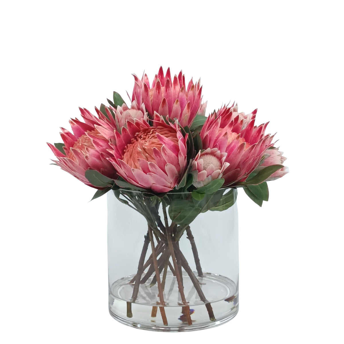 Protea Mix Silk Flower Arrangement in Cylinder Glass Vase. Front view of arrangement available from www.plantcouture.co.za