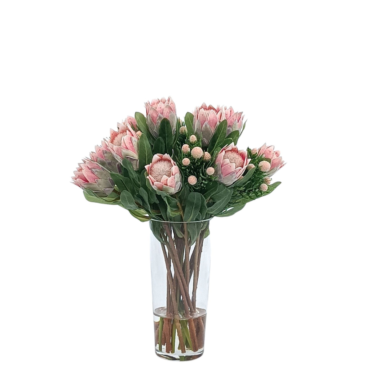 Protea & Protea Spray Silk Flower Arrangement in Cone Glass Vase. Front view of arrangement available from www.plantcouture.co.za.