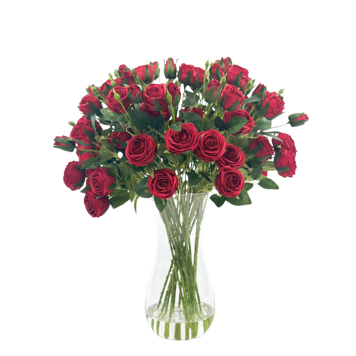 Roses Red Silk Flower Arrangement in Waisted Glass Vase. Front view. Plant Couture.