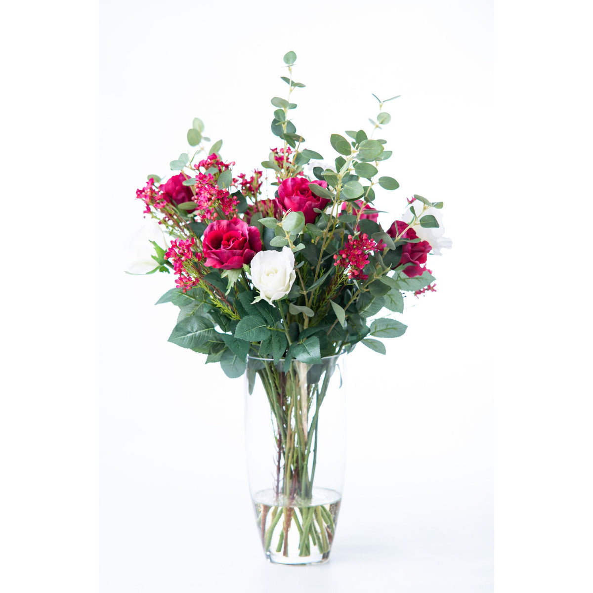 Rose Eucalyptus Arrangement in Glass Vase. Front view. Available from Plant Couture.