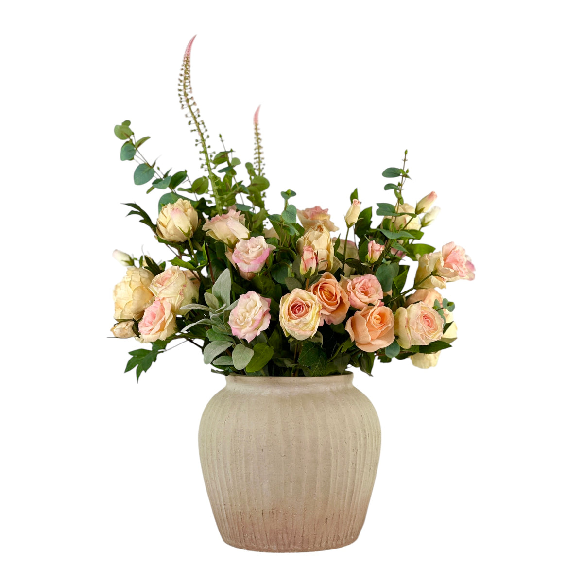 Bouquet of faux flowers in a beige vase on a white background
